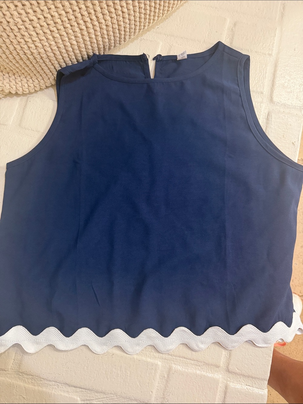 Scallop edge, sleeveless blouse